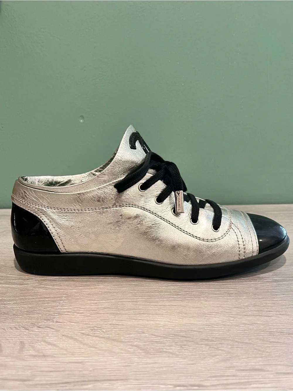 CHANEL Silver and Black Low-Top Lace-Up Sneaker